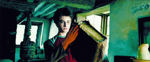 Harry Potter Book GIF - Harry Potter Book Teeth GIFs