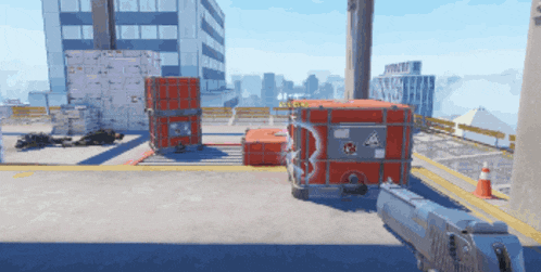a video game is being played on a rooftop with containers and a gun