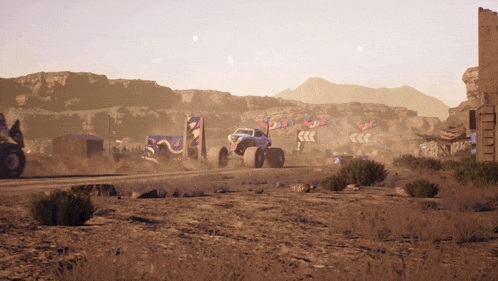 a monster truck is driving down a dirt road with arrows pointing in opposite directions