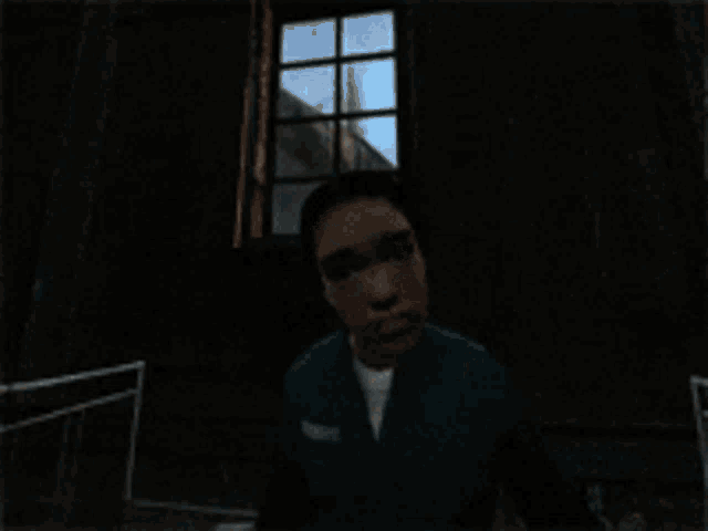 a man in a suit and tie is sticking his tongue out in a mirror .