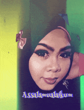 a woman wearing a hijab with the words assalamualaikum on the bottom right