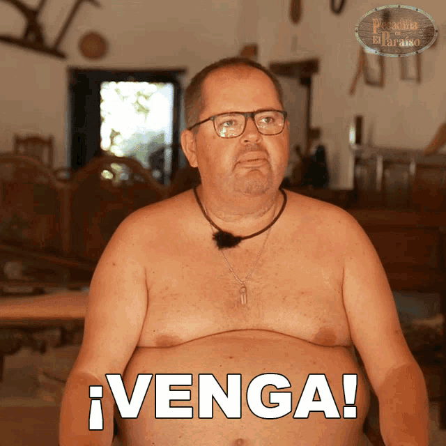 a shirtless man with glasses and a necklace says venga