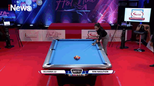silviana lu is playing pool against rini nasution on inews