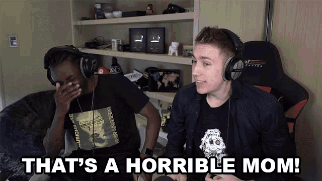 two men wearing headphones and a shirt that says that 's a horrible mom