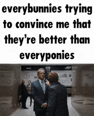 a man in a suit shakes another man 's hand in a hallway with the caption everybunnies trying to convince me