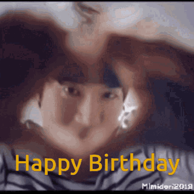 a blurry picture of a person with the words happy birthday
