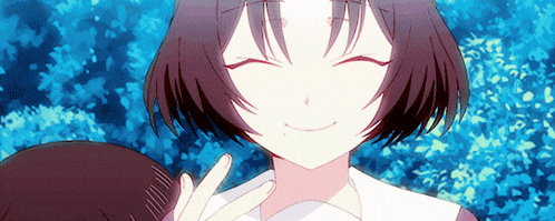 a girl with short hair is smiling and making a peace sign with her hand