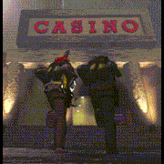 a couple of people standing in front of a casino