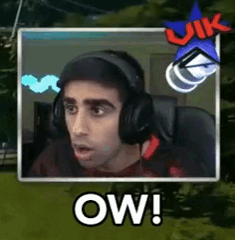 a man wearing headphones says ow in a picture