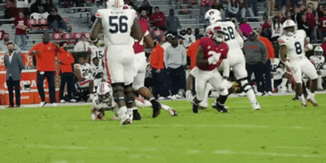 a football player with the number 56 on their jersey