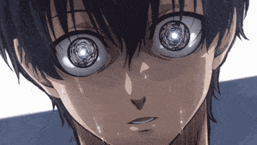 a close up of a person 's face with tears coming out of his eyes