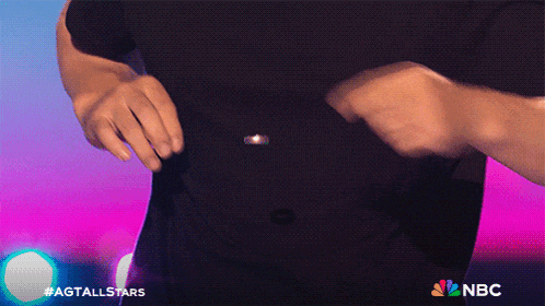 a person 's torso is shown with the nbc logo on the bottom