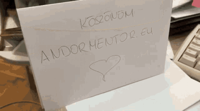 a piece of paper that says andor mentor eu
