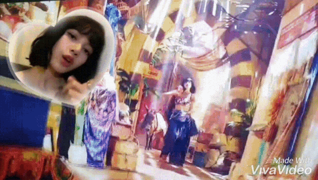 a woman in a white hat is standing in front of a painting of a woman in a belly dance costume .