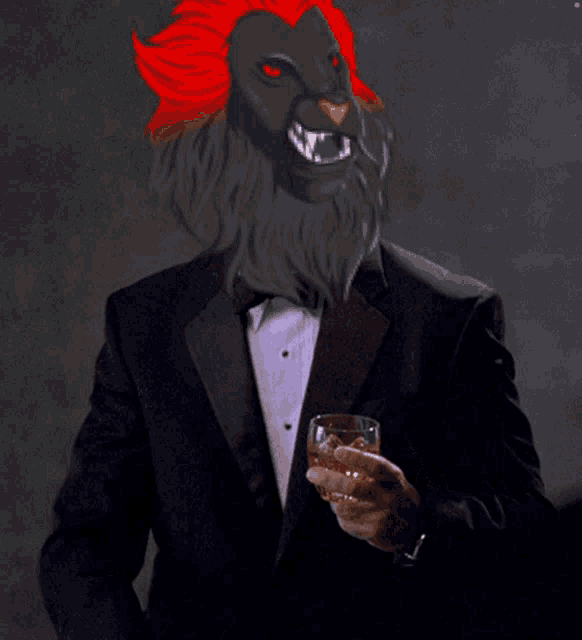 a man in a tuxedo with a lion mask on his head holds a glass of whiskey