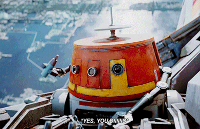 a robot says " yes you did " while sitting on top of a building
