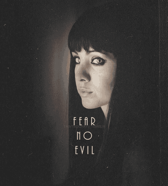 a black and white photo of a woman with the words fear no evil