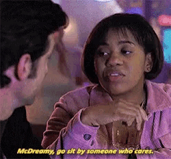 a man and a woman are having a conversation and the woman is saying " mcdreamy go sit by someone who cares "