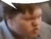 a blurry picture of a man 's face with a speech bubble above his head .