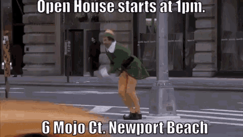 a man in a green elf costume is standing on a street with a sign that says open house starts at 1pm
