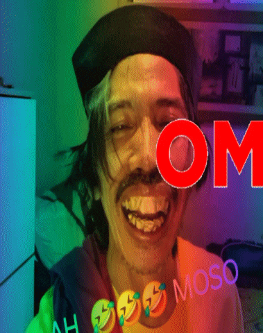 a man is wearing a hat and smiling with the word om in the foreground