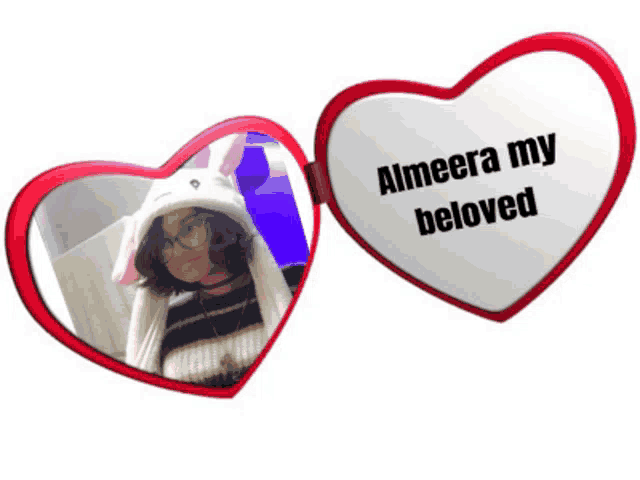 a heart shaped mirror with the words almeera my beloved