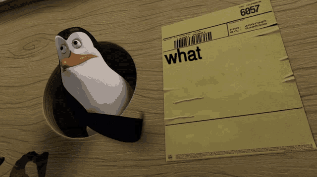 a penguin is looking out of a hole next to a piece of paper that says what