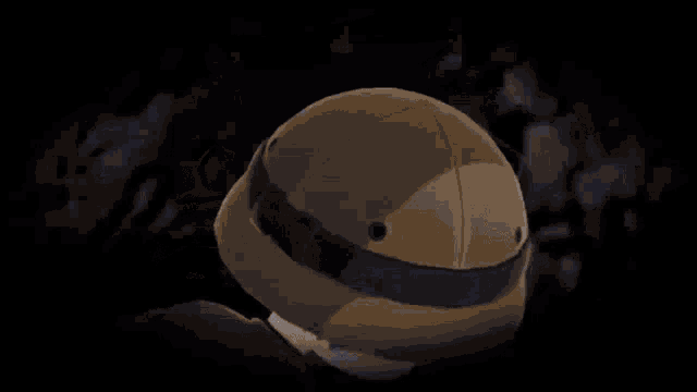 a robotic hand is reaching out to touch a person 's face