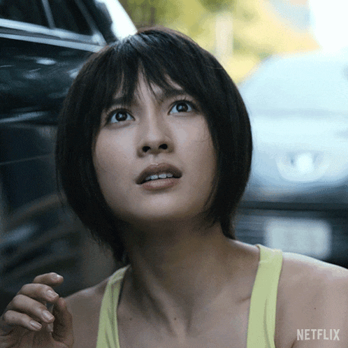 a close up of a woman 's face with netflix written on the bottom