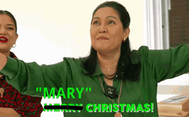 a woman in a green shirt is saying " mary "