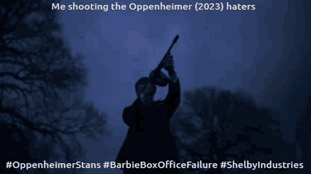 a man holding a torch in the dark with the caption " me shooting the oppenheimer 2023 haters "
