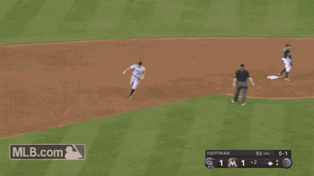 a baseball game is being played and the scoreboard says hoffman