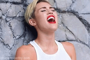 Miley Cyrus Eat GIF - Miley Cyrus Eat Cat GIFs