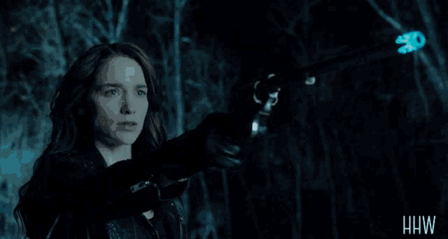 a woman holding a gun with the words " make your peace " on the bottom