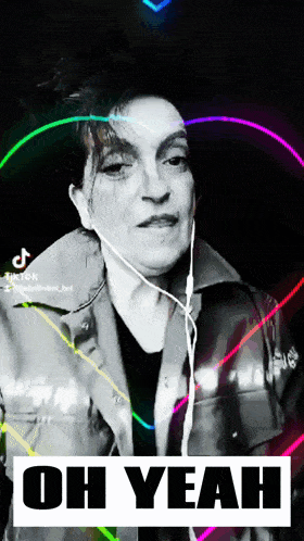 a woman is wearing headphones and the words oh yeah are on the bottom