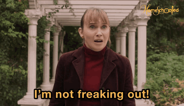 a woman says i 'm not freaking out in front of some columns