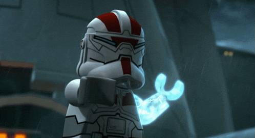 a lego clone trooper is holding a blue wrench in his hand