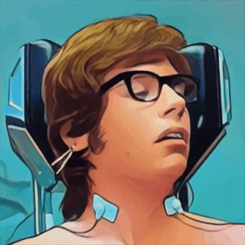 a man wearing glasses is laying in a chair
