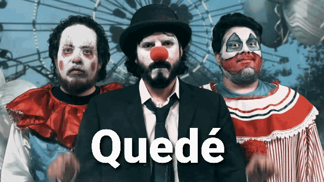 a group of clowns with quede written in white