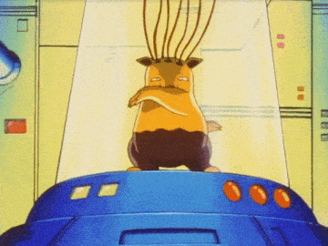 a cartoon character is standing on top of a blue item