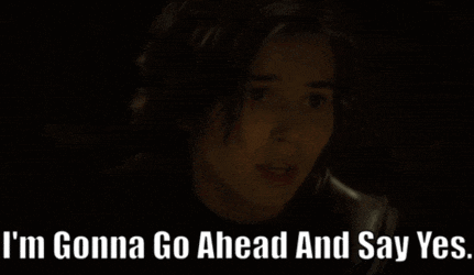 a woman says " i 'm gonna go ahead and say yes " in a dark room