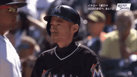 a man in a baseball uniform with the letter m on it