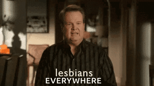 a man in a striped shirt is talking about lesbians everywhere .
