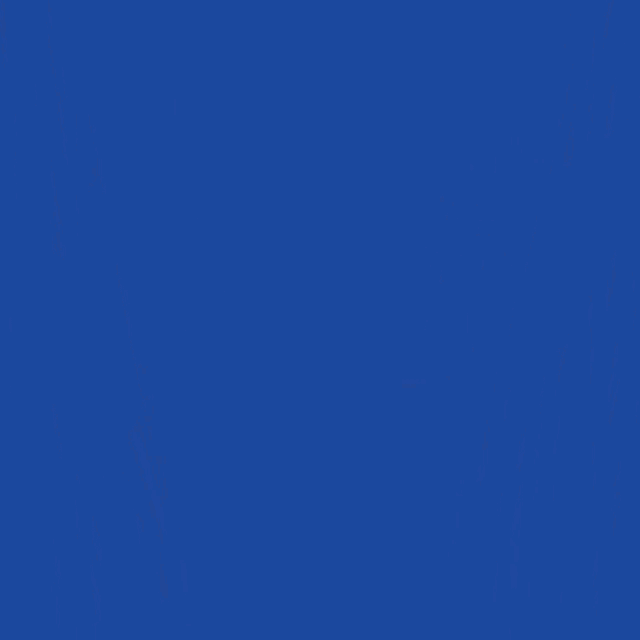 a blue curtain has a white flower and green leaf on it