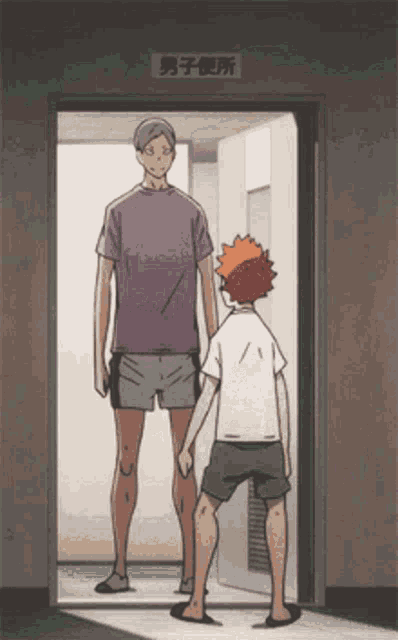 a man in a purple shirt stands next to another man in a white shirt
