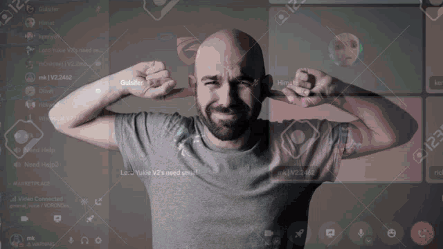 a man covering his ears with his hands in front of a screen that says " low talk v2 is used on "