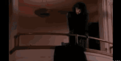 a close up of a woman 's face with a blurred background in a movie .
