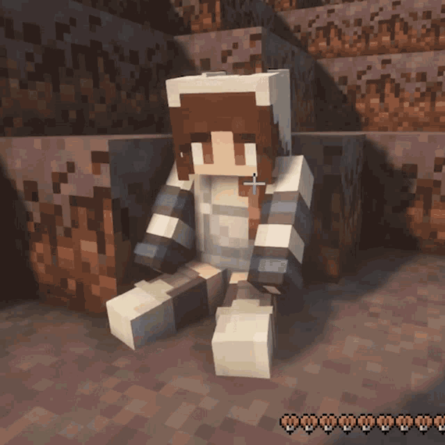 a minecraft character is sitting in front of a brick wall
