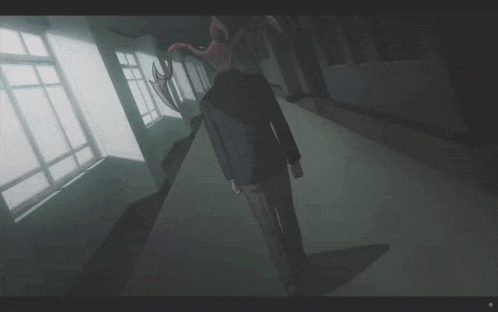 a dark room with a window and a shadow on the ceiling