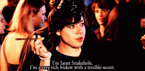 a woman in a black dress says i 'm janet snakehole